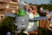 Guests ride Dumbo the Flying Elephant at the Magic Kingdom theme park.